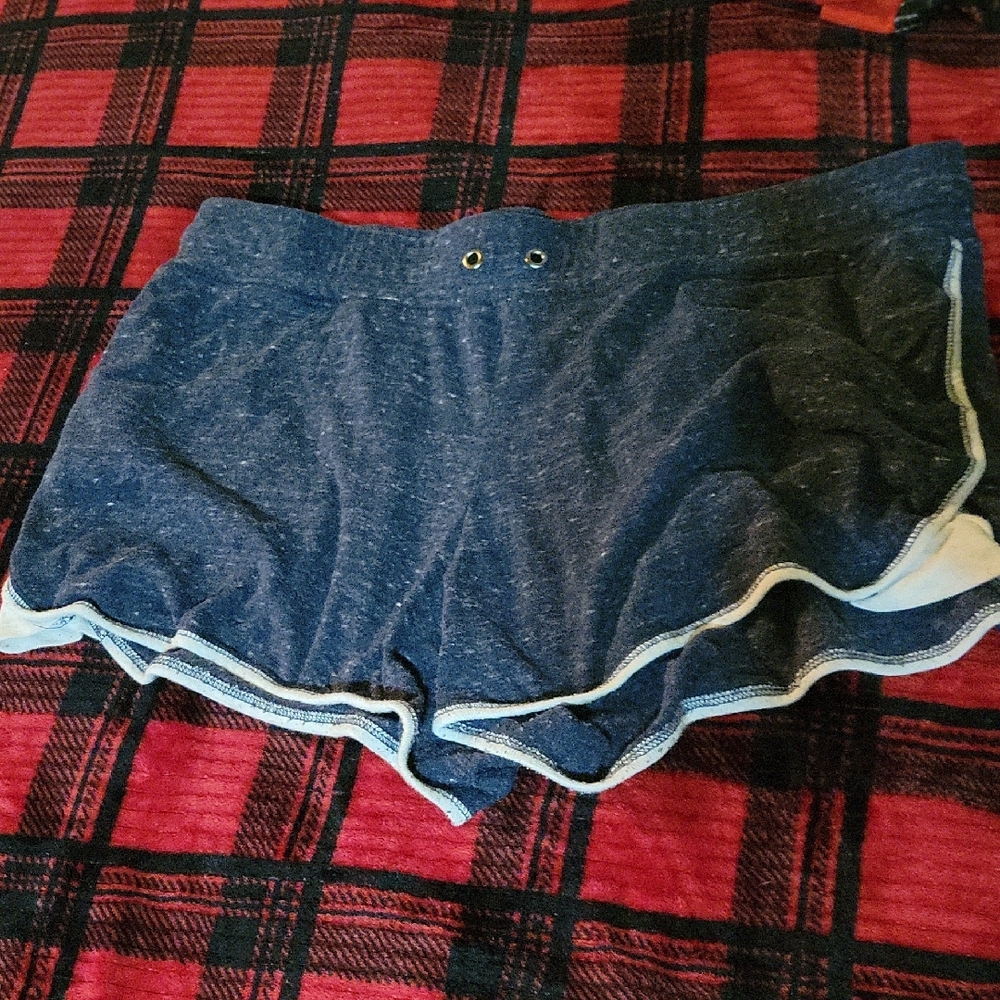 Blue Athletic Shorts with White Trim and Elastic Waistband